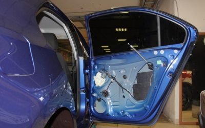 Car tuning. Disassembled car. Disassembled blue car door for ins